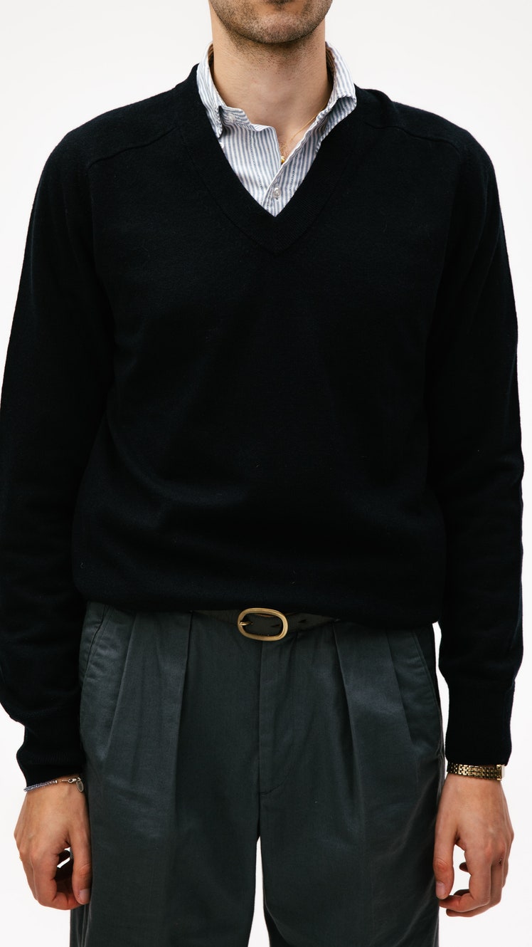 Image may contain Clothing Long Sleeve Sleeve Knitwear Sweater Adult Person Sweatshirt and Shirt