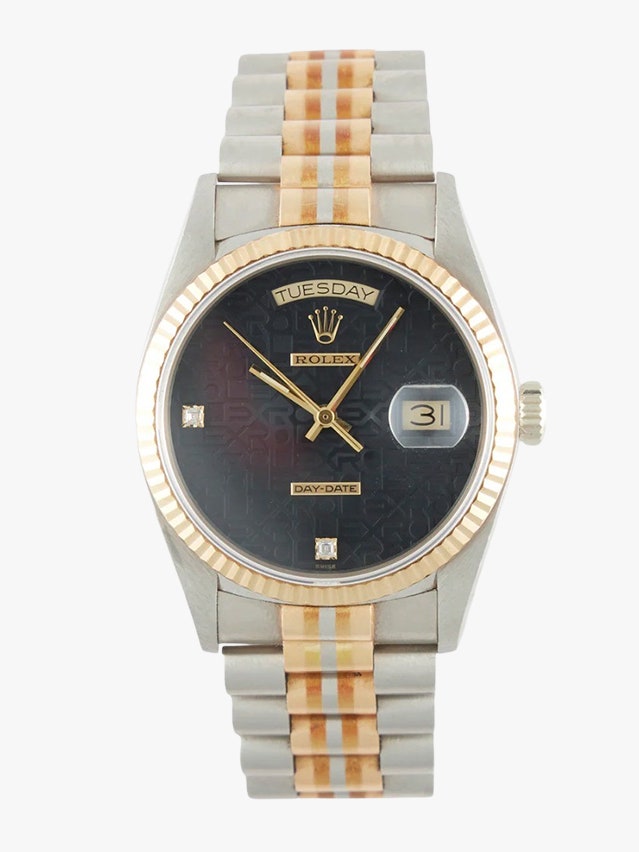 Image may contain Wristwatch Arm Body Part and Person