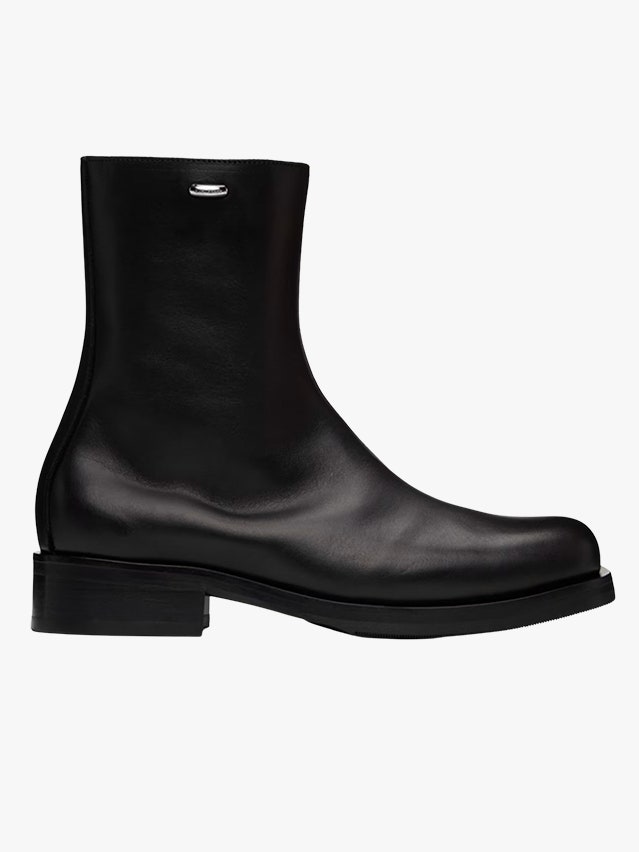Image may contain Clothing Footwear Shoe Boot and Riding Boot