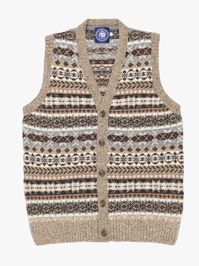 Image may contain Clothing Vest Lifejacket Knitwear and Sweater