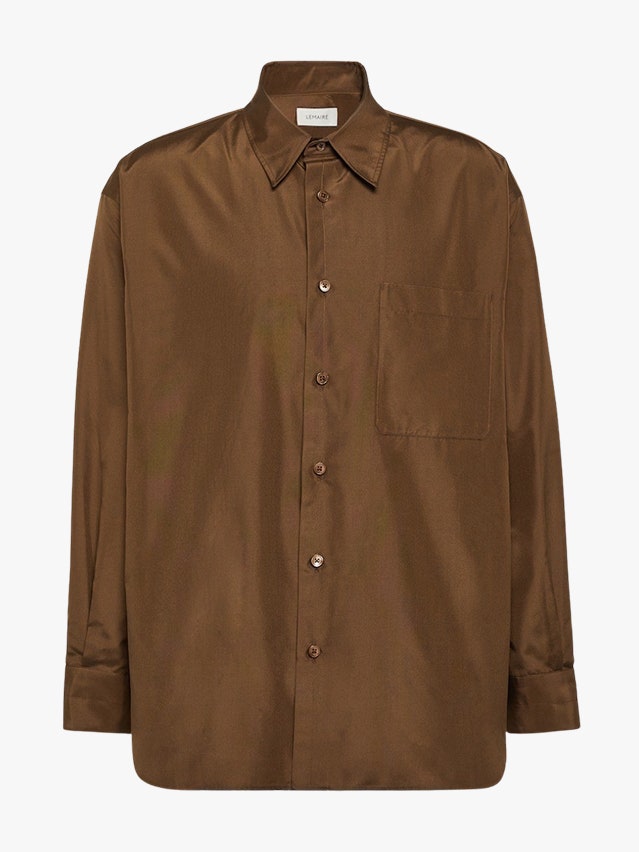 Image may contain Clothing Shirt Long Sleeve Sleeve Blouse Dress Shirt and Khaki