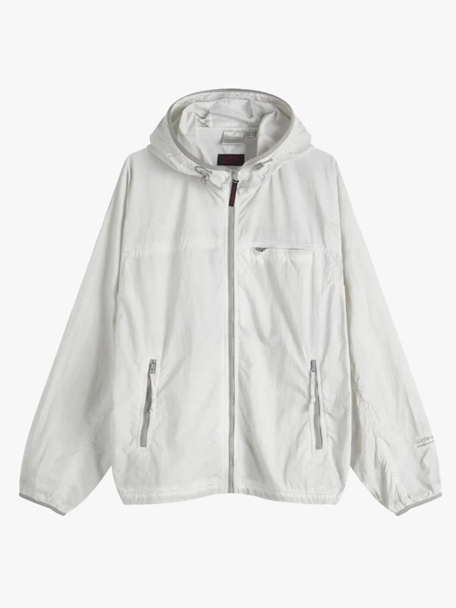 Image may contain Clothing Coat Jacket and Blouse