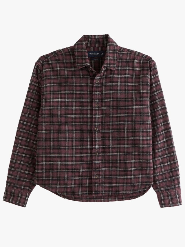Image may contain Clothing Shirt Dress Shirt Long Sleeve Sleeve and Blouse