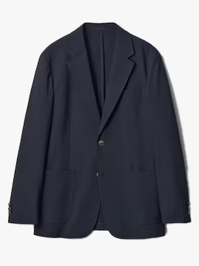 Image may contain Blazer Clothing Coat and Jacket