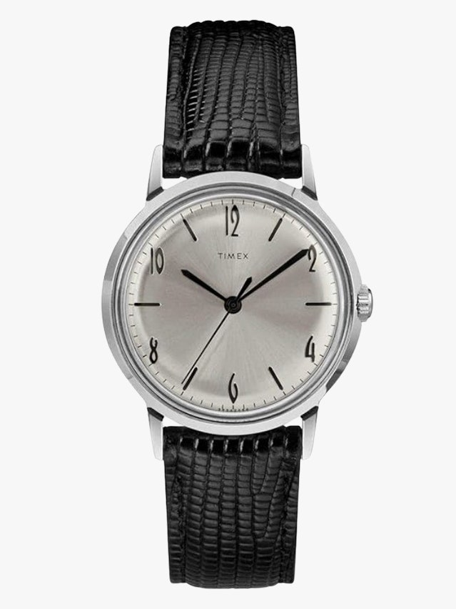 Image may contain Wristwatch Arm Body Part and Person