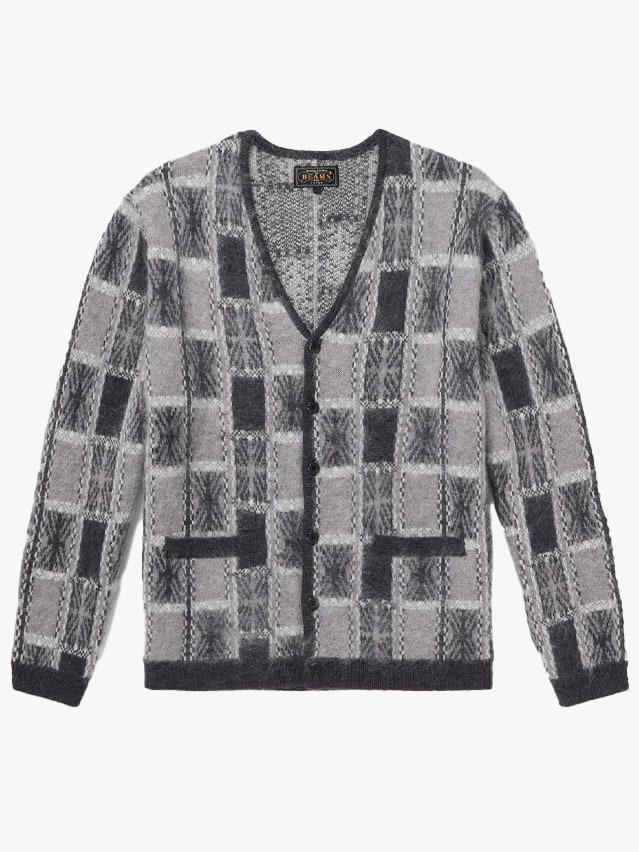 Image may contain Clothing Knitwear Sweater and Coat