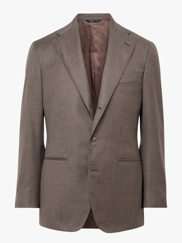 Image may contain Blazer Clothing Coat Jacket Formal Wear Suit Home Decor and Linen