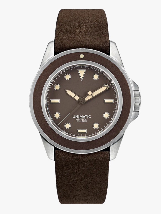 Image may contain Wristwatch Arm Body Part and Person