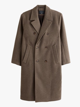Image may contain Clothing Coat and Overcoat