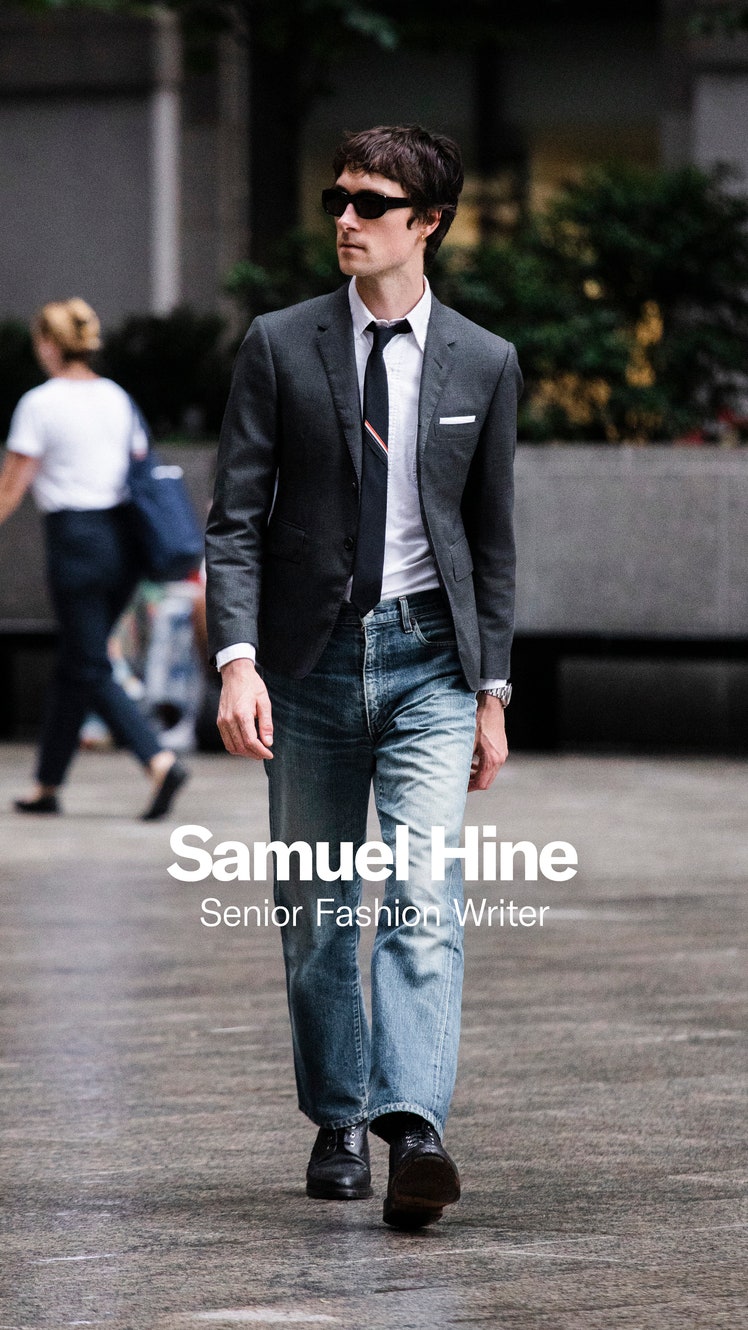 Image may contain Blazer Clothing Coat Jacket Pants Jeans Formal Wear Suit Person Walking Adult and Accessories