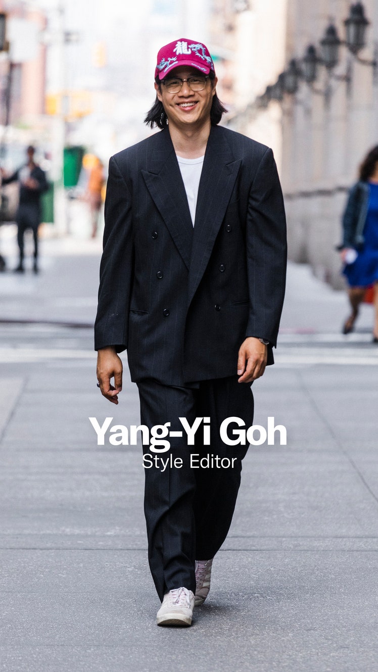 Image may contain Clothing Formal Wear Suit Person Walking Coat Blazer Jacket Adult Accessories Glasses and Hat
